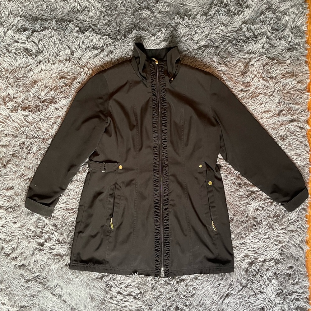 Woman’s black coat